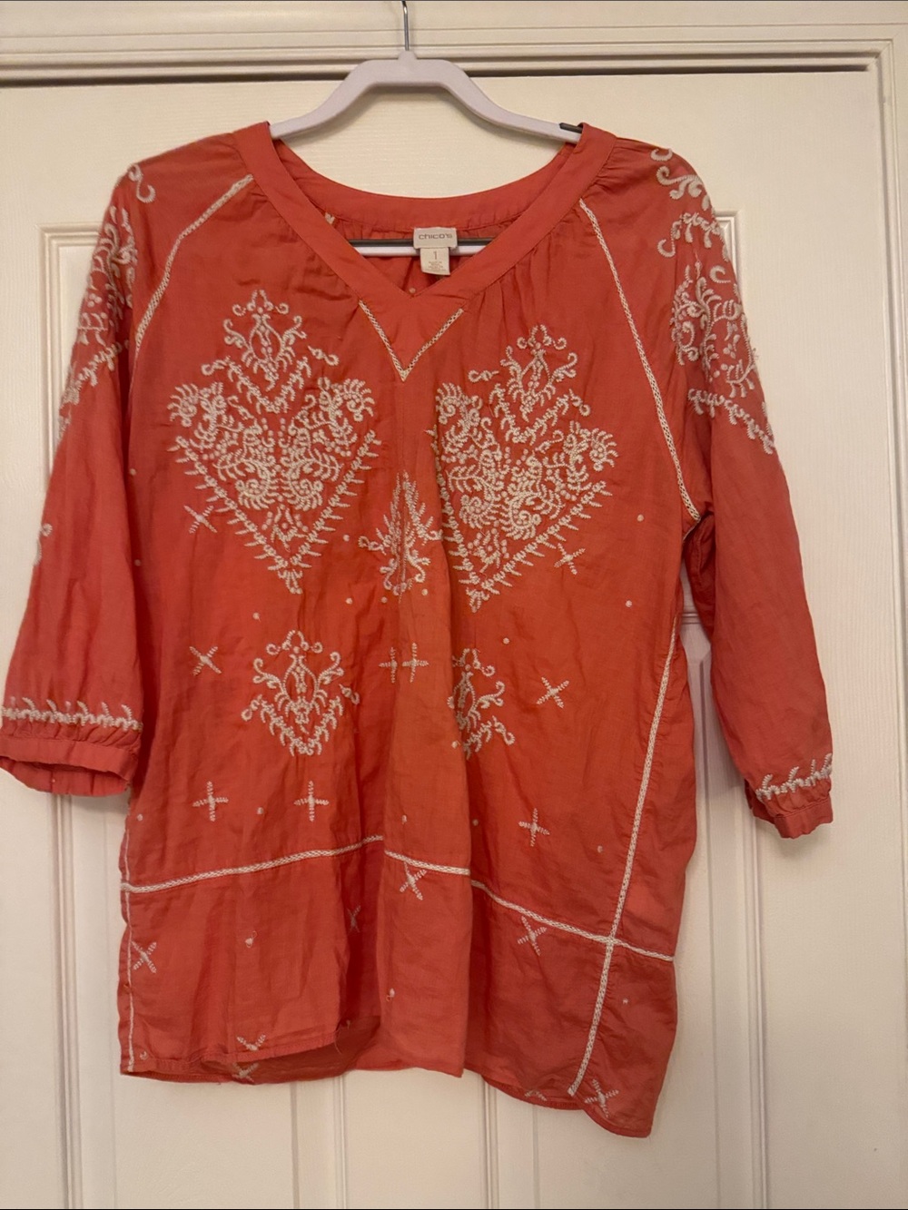 EUC Chico’s Orange with embroidered cream detail in size 1 (medium)